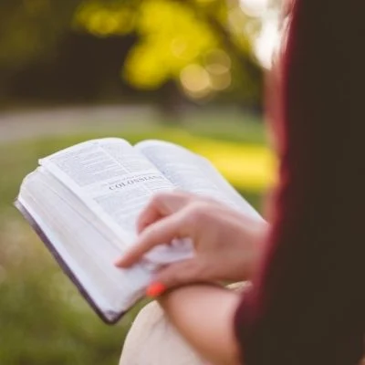 woman reading Bible